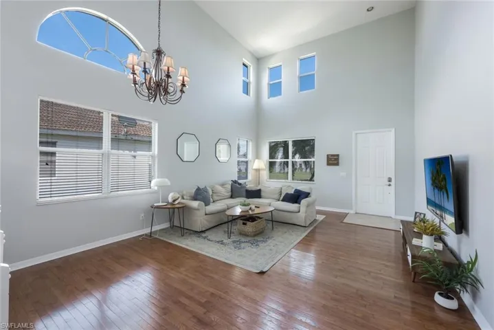 Grand Great Room- Wood Flooring, Fresh Paint, Many Living Options with Combo Dining
