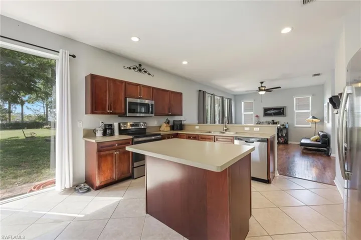 Sunny and Bright, Sliders Outside, Island, SS Appliances