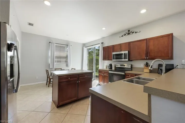 View II of the Spacious Kitchen, Showing Eating Area