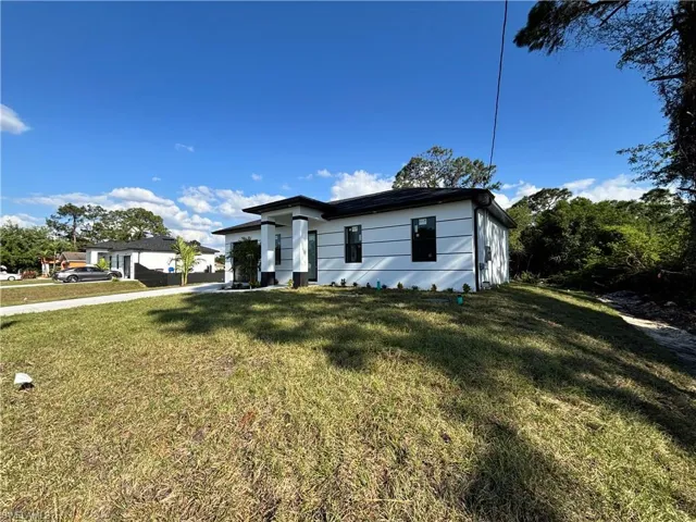 View of front of house with a front lawn