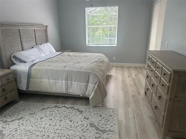 Bedroom featuring light wood-style flooring