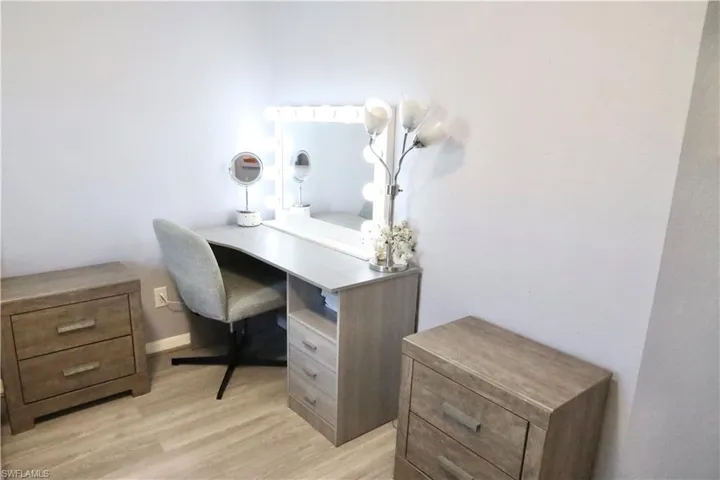 Guest Bedroom featuring light wood-type flooring