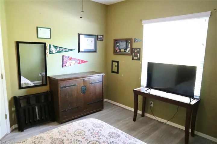 Office featuring light wood-type vinyl flooring