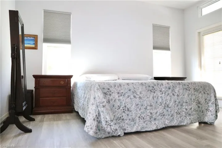Owners Suite with French doors to pool.