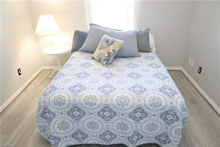Bedroom featuring light wood-type vinyl flooring