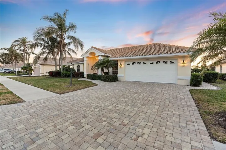 Extra wide driveway with custom pavers