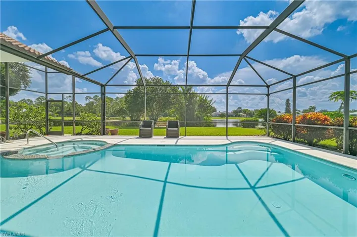 View of pool with a lanai
