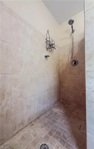 Full bath with tiled shower