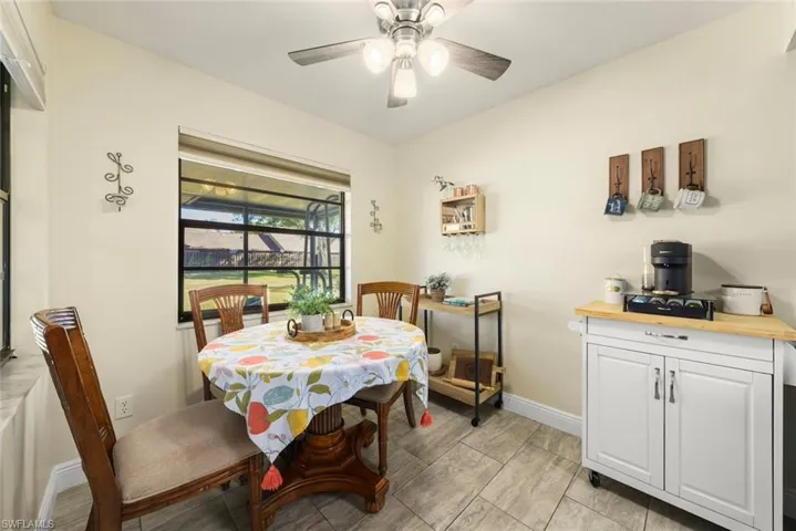 Dining area with ceiling fan