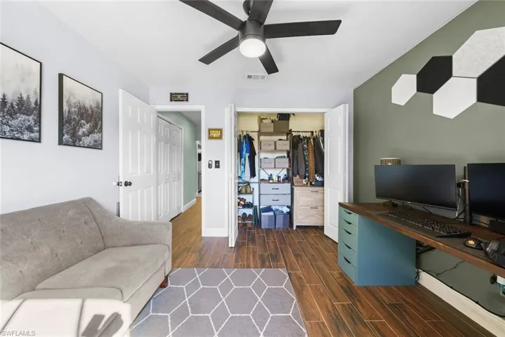 Office area featuring ceiling fan