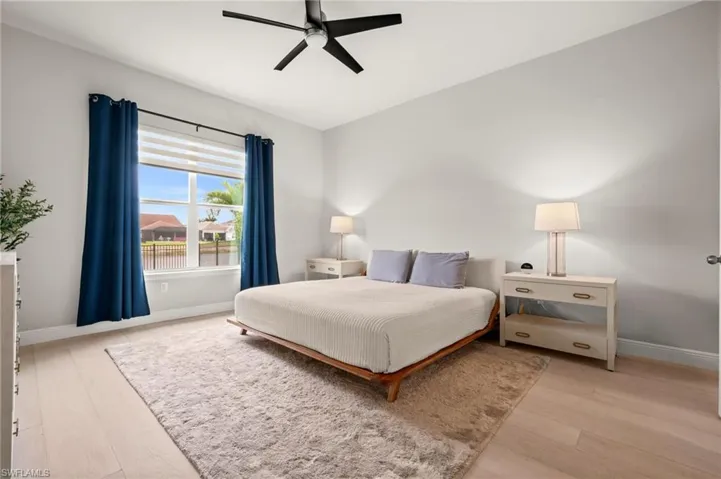 Bedroom featuring a ceiling fan