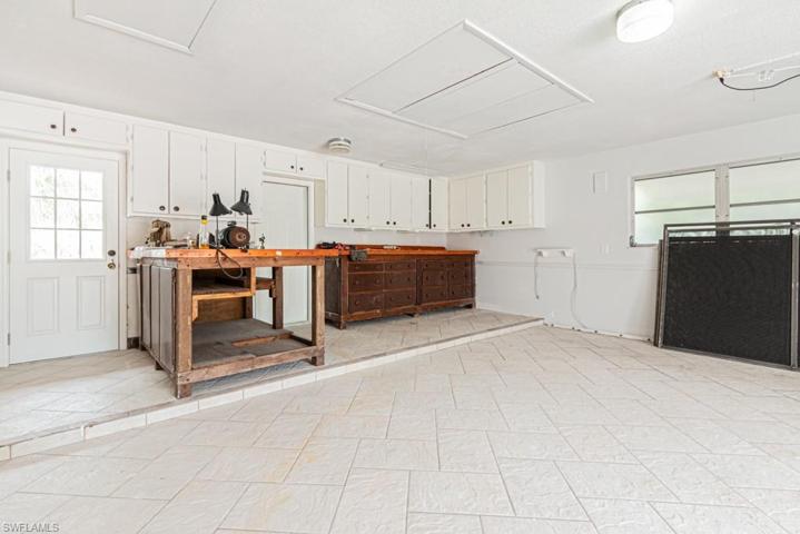 Oversized Garage with Work Benches