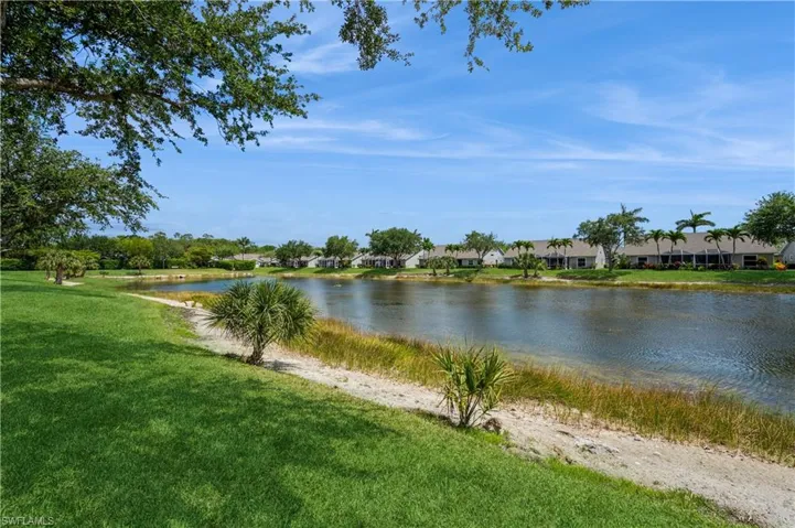 Property view of water with a residential view
