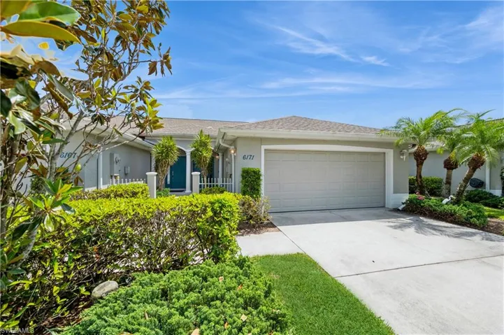 Ranch-style house featuring stucco siding, concrete driveway, a shingled roof, and a garage