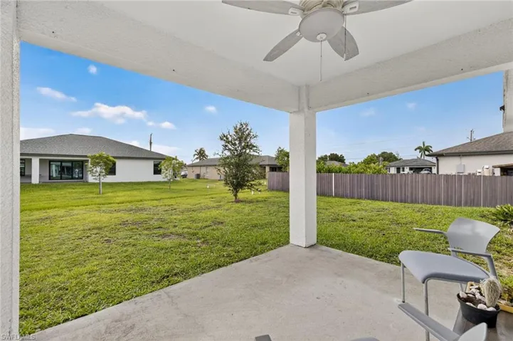 View of patio with a ceiling fan