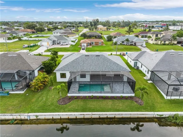 Aerial view of residential area with a pool area
