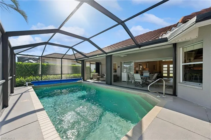 Outdoor pool with a patio area