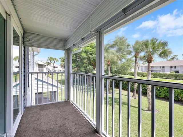 Screened Lanai with Hurricane Shutters & Landscaped View