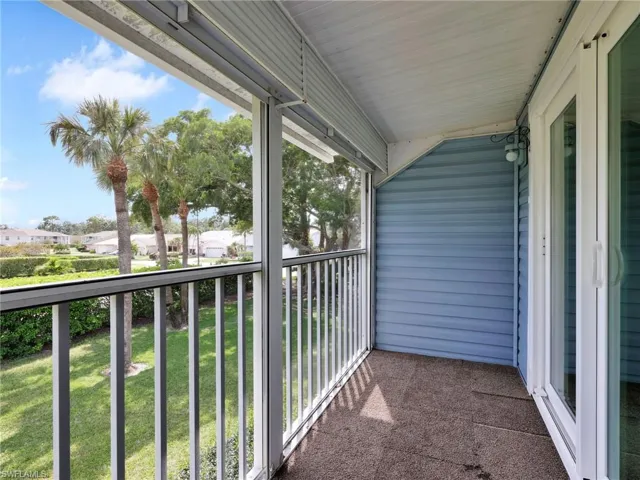 Screened Lanai with Hurricane Shutters & Landscaped View