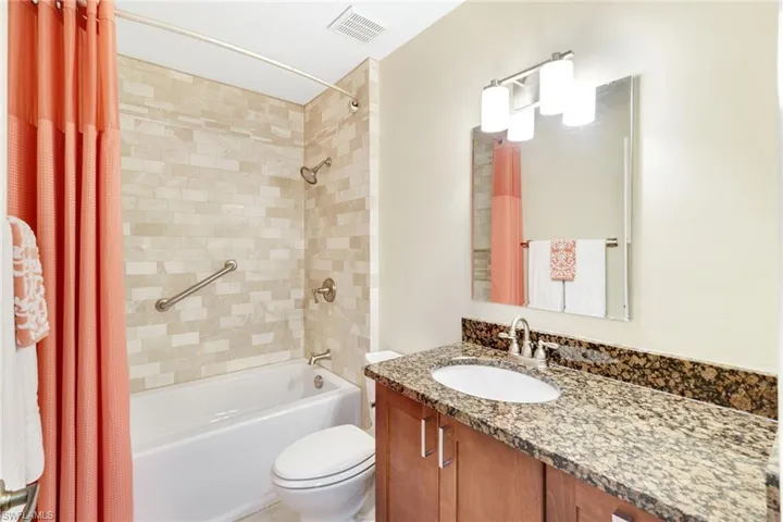 Remodeled guest bath features a new oversized soaking tub for added comfort