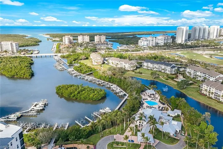 Tarpon Club resort pool, tikki hut bar, restaurant, fitness and Bocce leagues