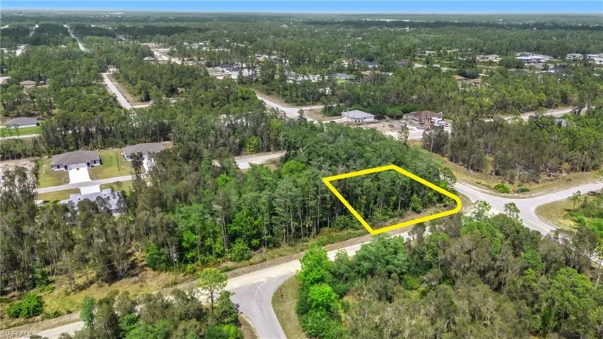 Aerial view with a wooded view