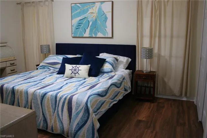 Bedroom with wood finished floors