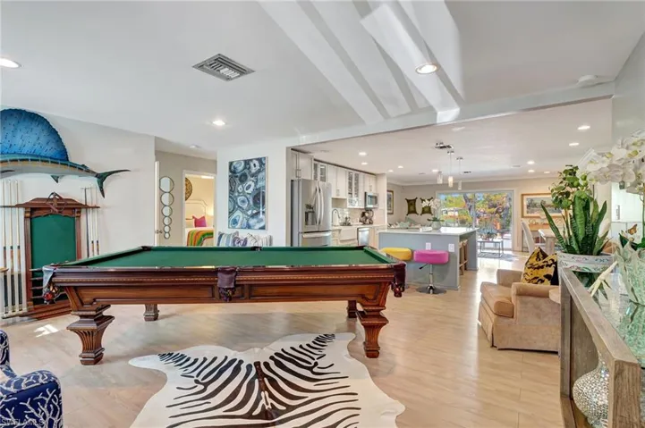 Rec room with pool table, recessed lighting, and light wood-style flooring