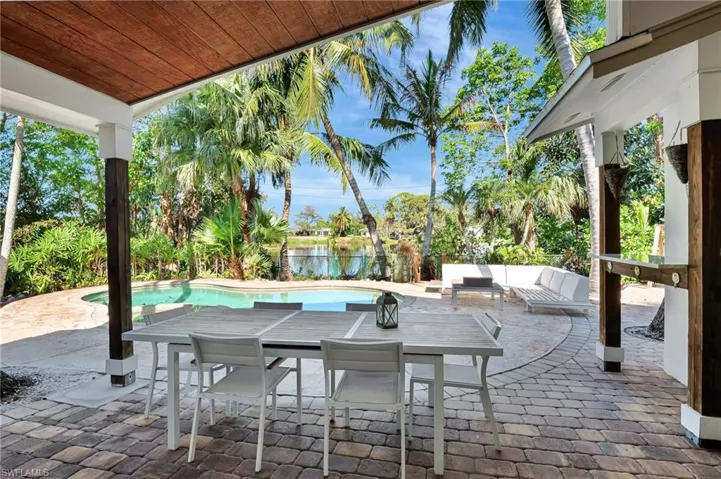 View of patio / terrace featuring an outdoor hangout area and a water view