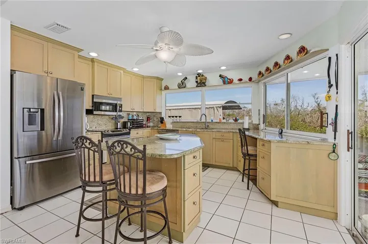 Updated kitchen with granite counters and stainless appliaces.