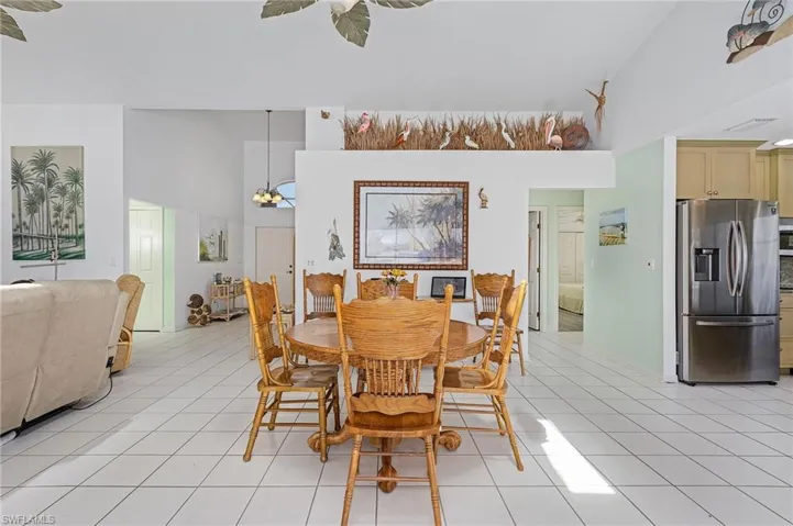 Kitchen, Dining, and Living looking to the entry and guest quarters.