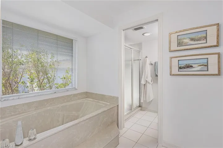 Master Bath with soaking tub and separate shower.