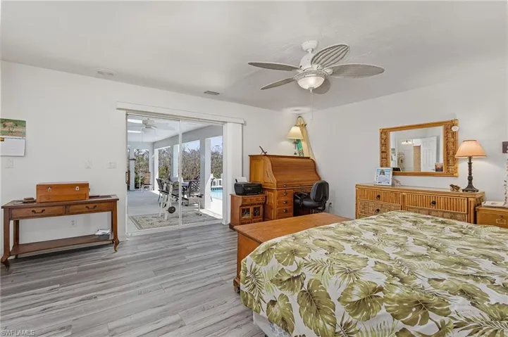 Master bedroom has sliders leading to the pool/lanai.