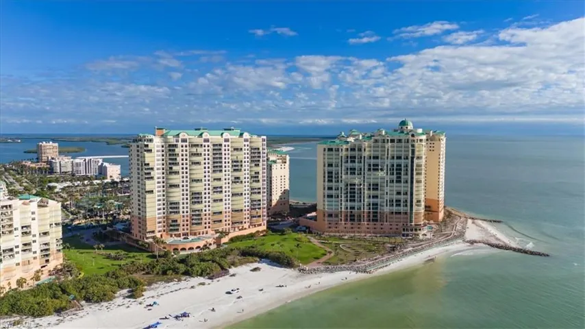 Bird's eye view with a view of the beach and a water view