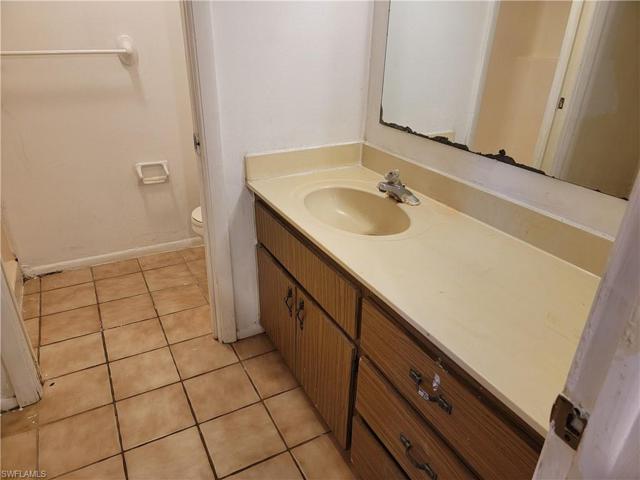 Downstairs Bath with Utility room inside.