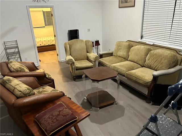 Living room featuring hardwood / wood-style floors