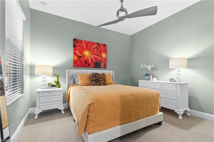 Guest bedroom feauturing contemporary ceiling fan