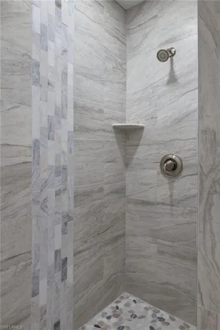 Bathroom with tiled shower