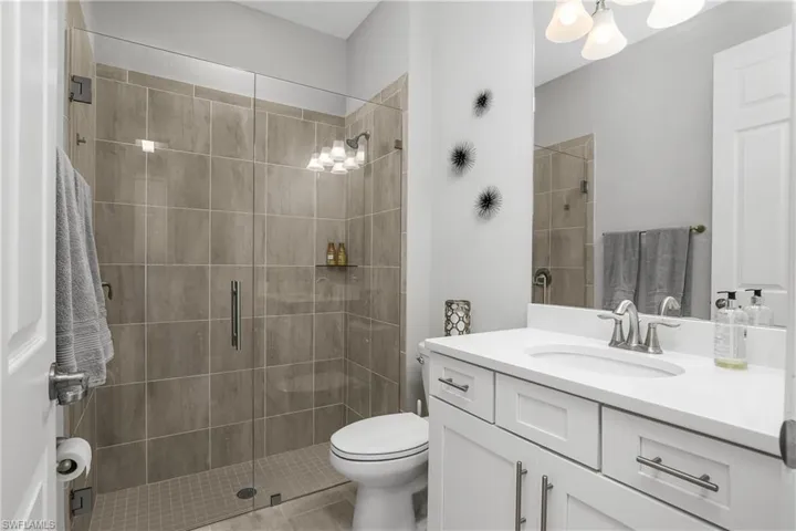 Guest bath with convenient walk-in shower.