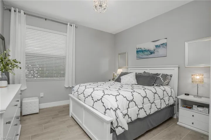 Guest bedroom provides plenty of privacy for visitors with a dedicated bath just outside the room.