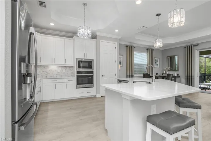 Designer lighting give this home a custom feel and are a great complement to all the natural light flowing through.