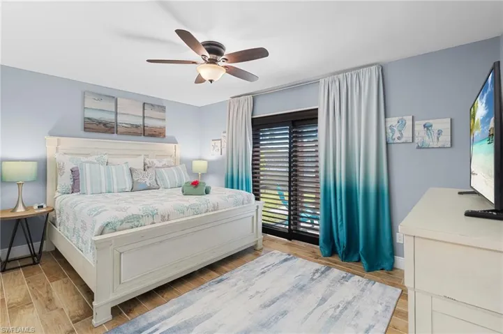 Third Bedroom has Sliders with Plantation Shutters to the Lanai