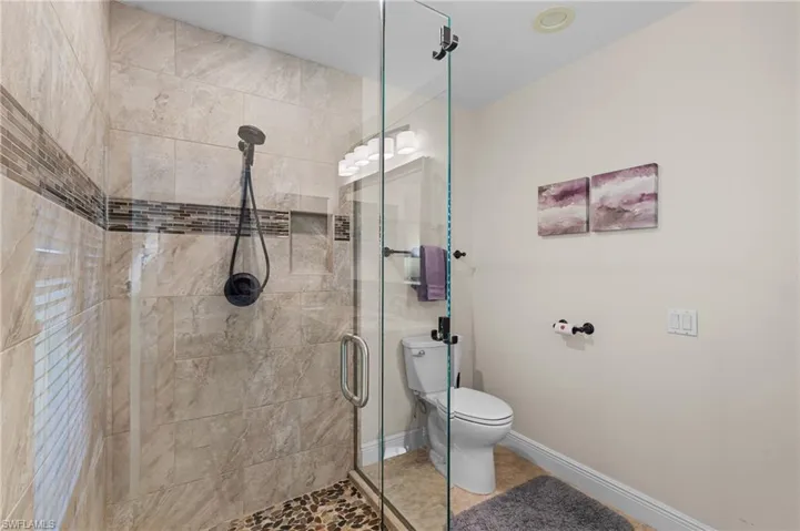 Large Tiled Shower in Primary Bedroom
