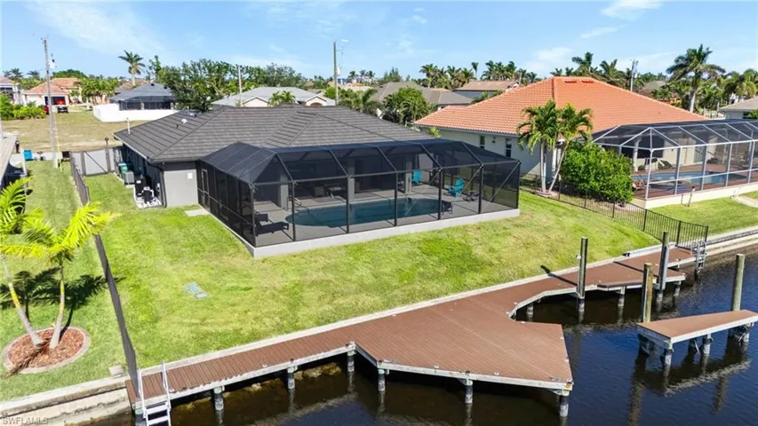 Back of Home with Boat Dock & Boat Slip