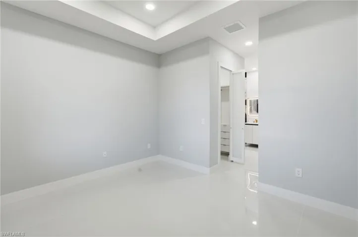 Unfurnished room with recessed lighting