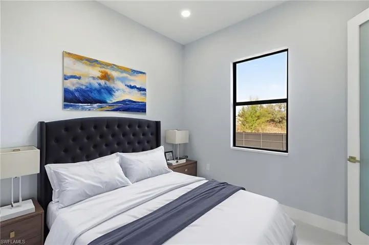 Bedroom featuring baseboards and recessed lighting