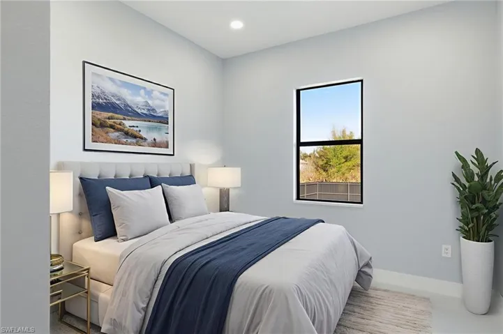 Bedroom with baseboards and recessed lighting