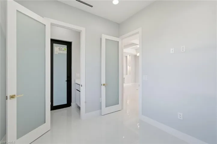 Unfurnished bedroom featuring recessed lighting