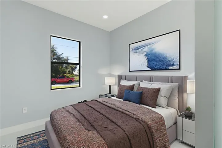 Bedroom featuring recessed lighting and baseboards