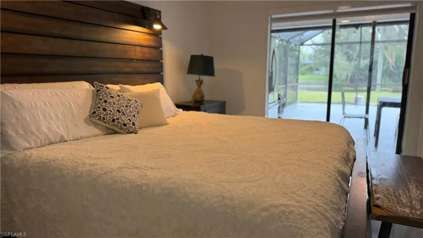 Bedroom featuring access to exterior